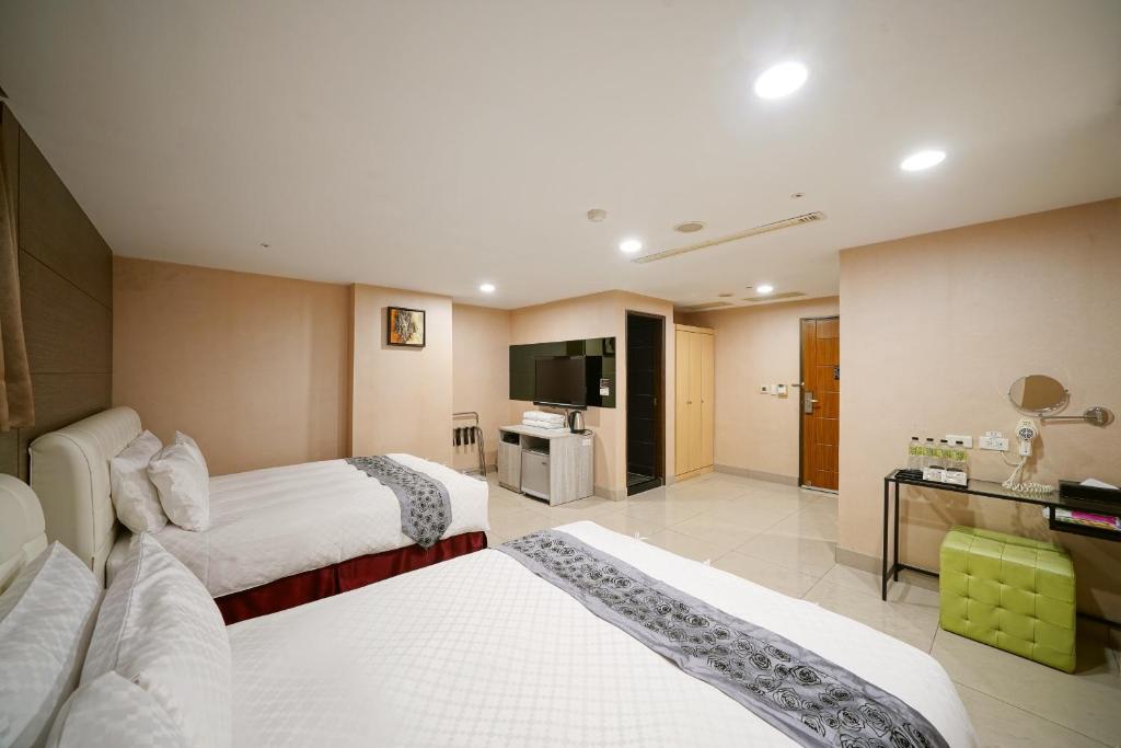 Postel nebo postele na pokoji v ubytování Sa-Yo Hotel - Pier 2