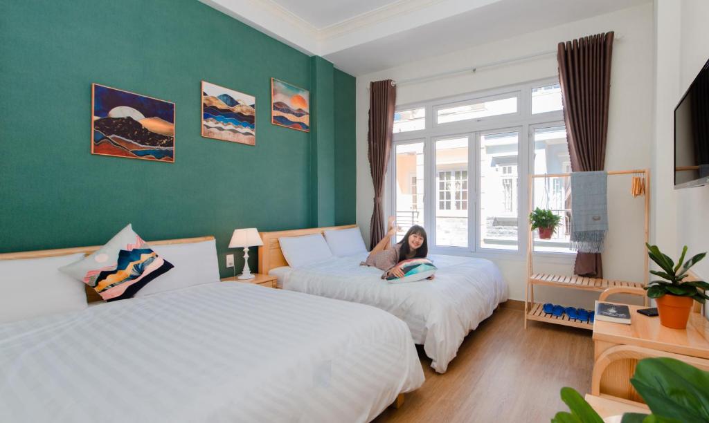 Moc Thach Hostel Dalat客房内的一张或多张床位
