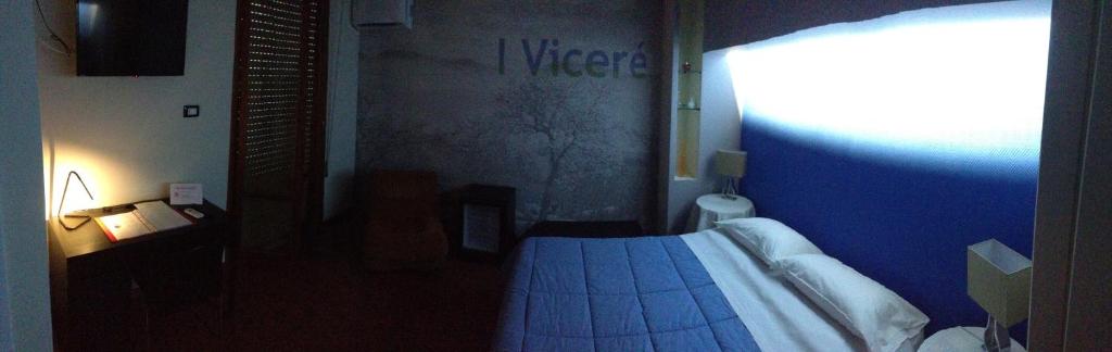 Postel nebo postele na pokoji v ubytování Mare Nostrum Petit Hôtel