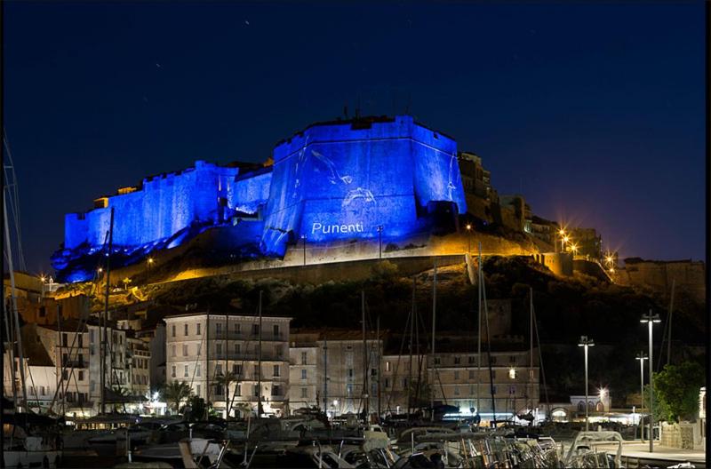 a large blue object on top of a building at L'Appart in Bonifacio