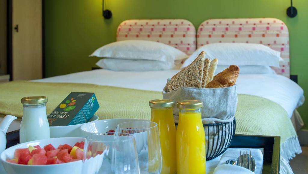 Postel nebo postele na pokoji v ubytování Minster Mill Hotel
