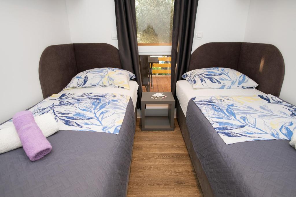 Postel nebo postele na pokoji v ubytování Authentic Camping Dalmatia