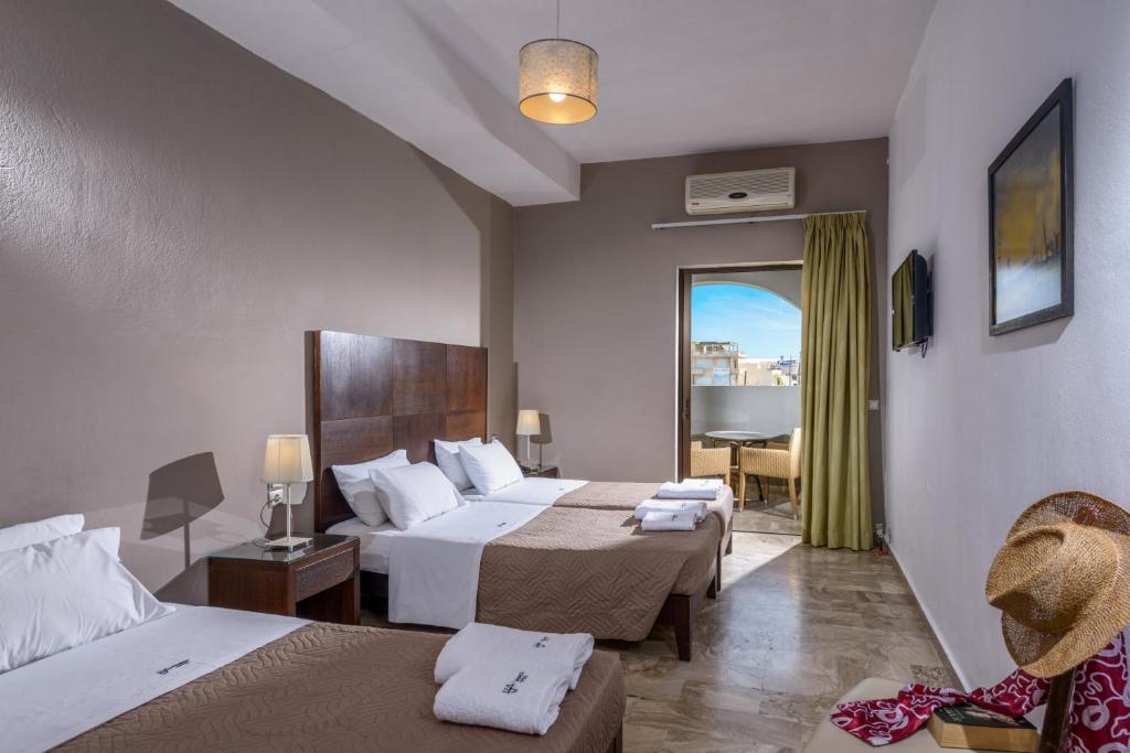 Postel nebo postele na pokoji v ubytování Vanisko Hotel
