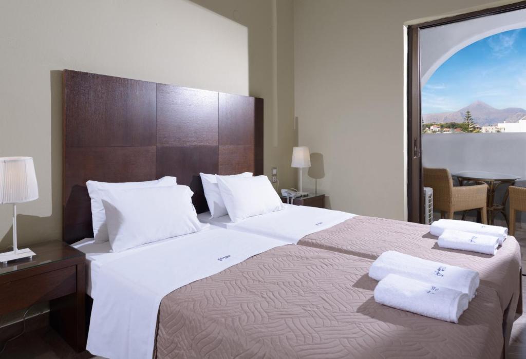 Postel nebo postele na pokoji v ubytování Vanisko Hotel