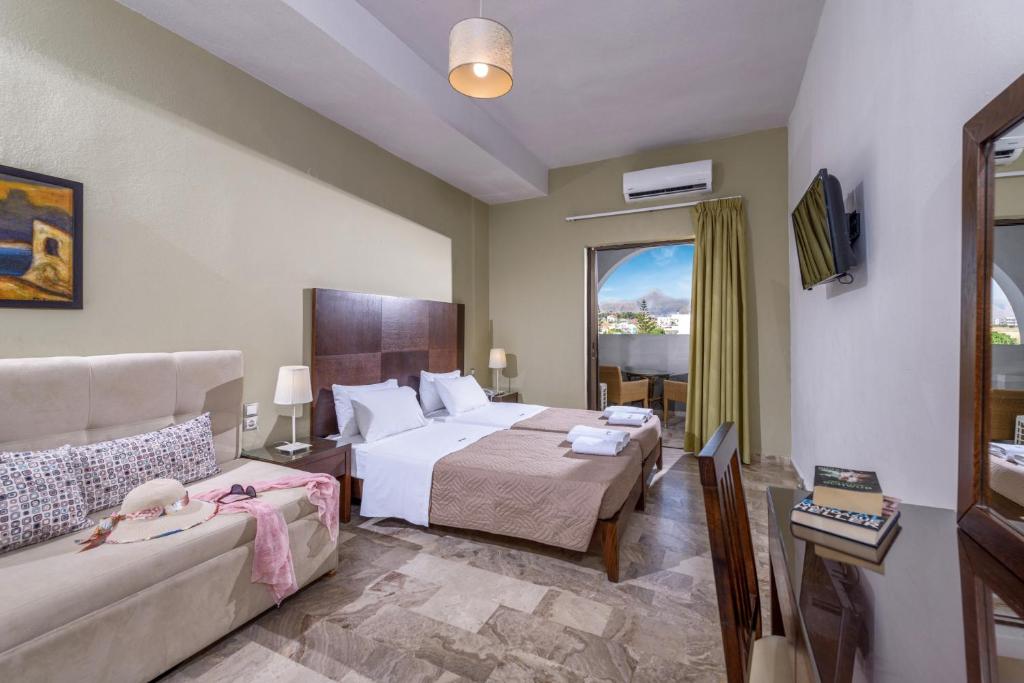 Postel nebo postele na pokoji v ubytování Vanisko Hotel