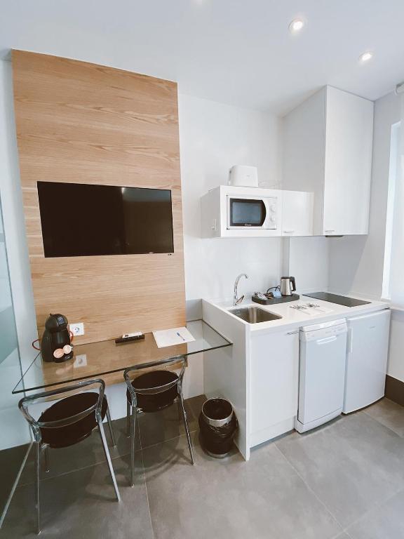 Kuchyň nebo kuchyňský kout v ubytování Salamanca Suites Libertad