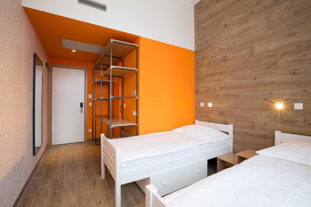 Postel nebo postele na pokoji v ubytování Hostel Link