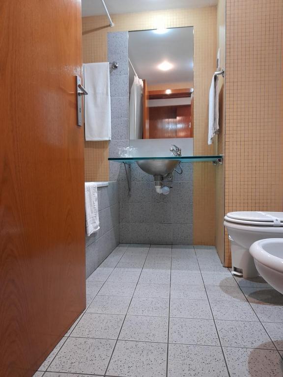 Koupelna v ubytování Hotel das Taipas