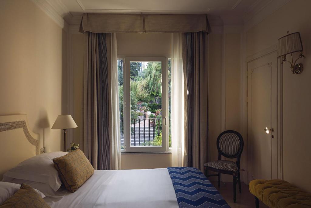Postel nebo postele na pokoji v ubytování Villa Sant'Andrea, A Belmond Hotel, Taormina Mare