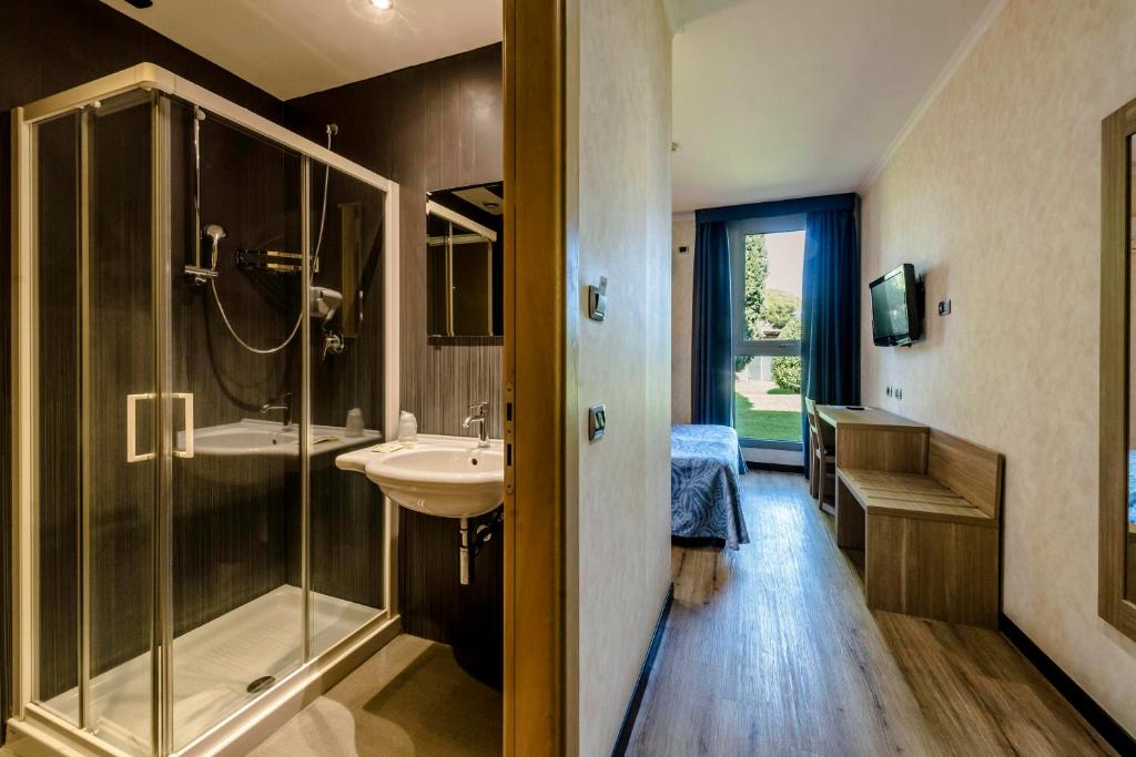 Koupelna v ubytování Hotel Roma Sud