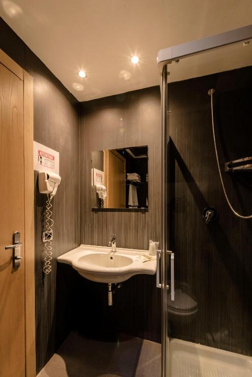 Koupelna v ubytování Hotel Roma Sud