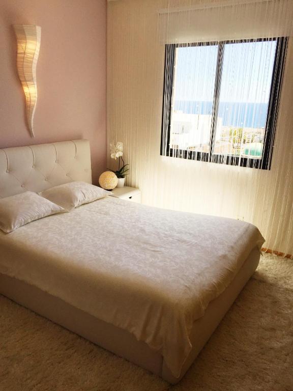 Posteľ alebo postele v izbe v ubytovaní Apartment VIParaiso
