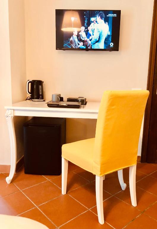 TV a/nebo společenská místnost v ubytování Casa Ciampi Locazione Turistica
