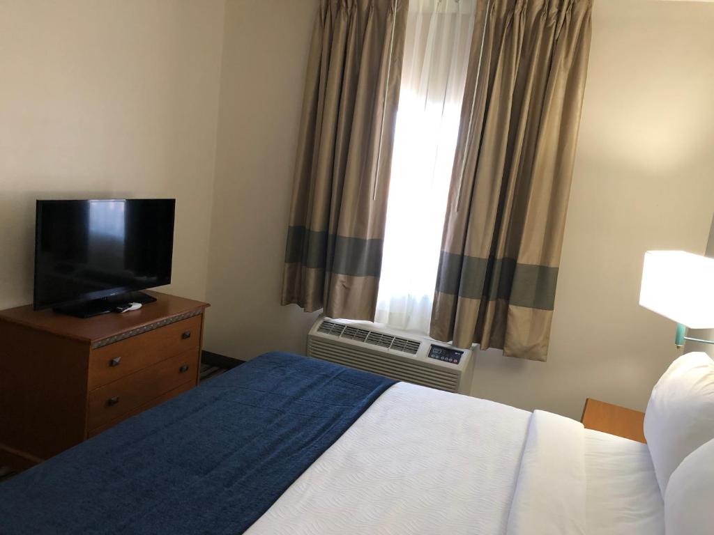 TV a/nebo společenská místnost v ubytování NavajoLand Inn