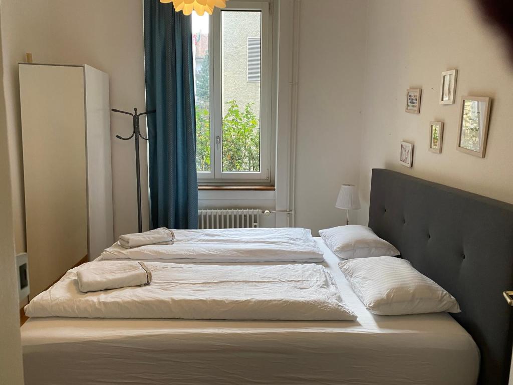 Letto o letti in una camera di ZüriZimmer