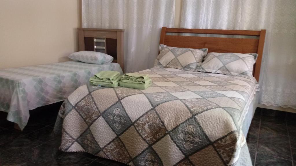 Postel nebo postele na pokoji v ubytování Casa com Flores