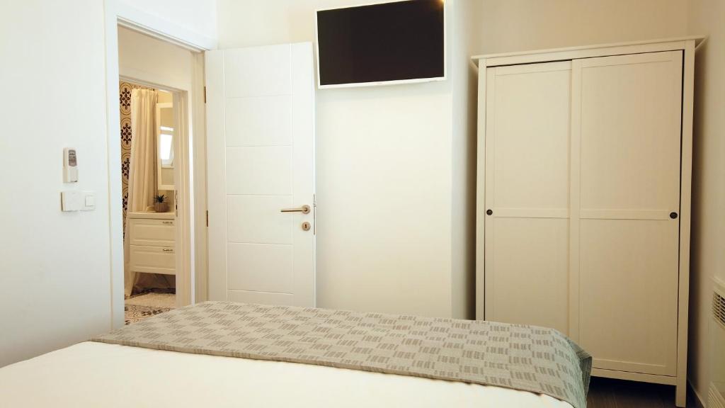 Posteľ alebo postele v izbe v ubytovaní Beach House Ana