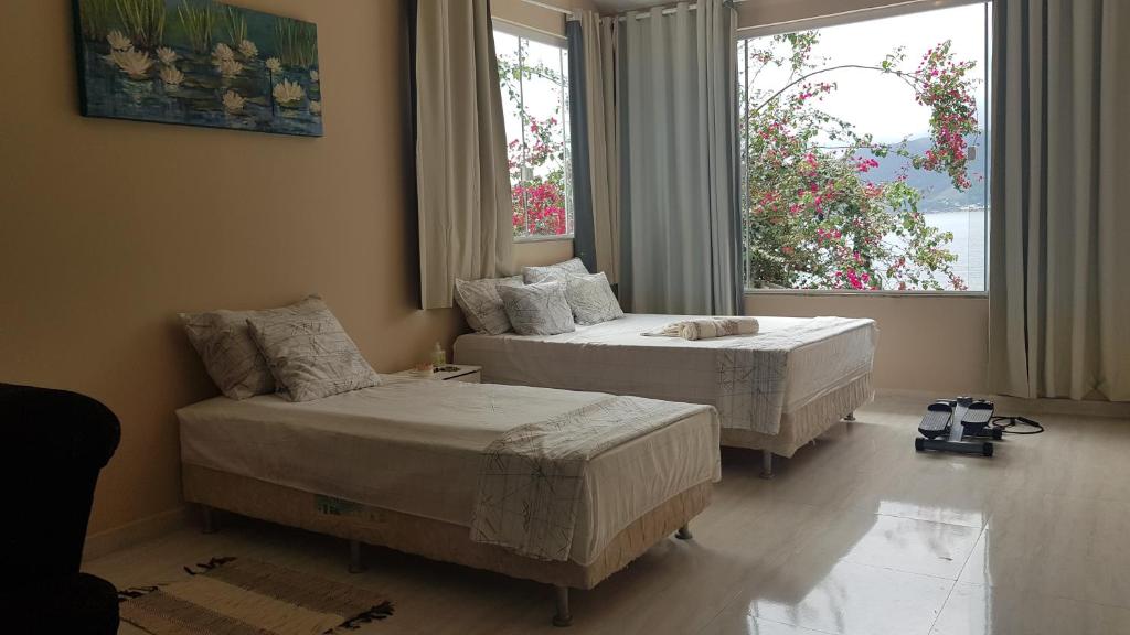  Casa em ilha paradisíaca com praia na varanda