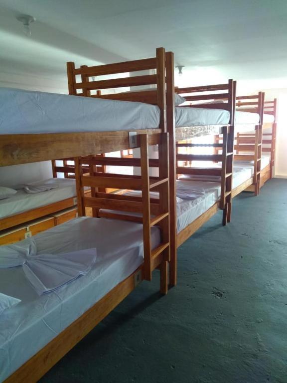Postel nebo postele na pokoji v ubytování Manhatã Hostel