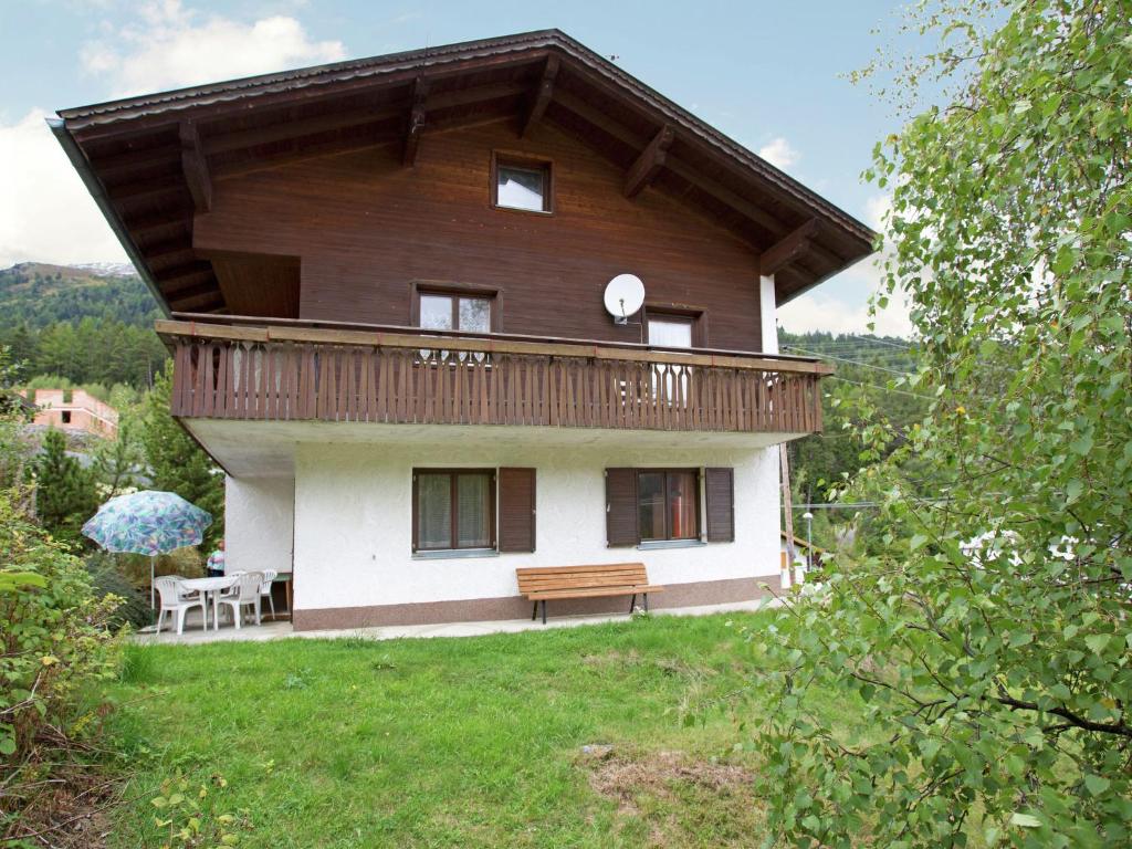 a large house with a balcony on top of it at Modern Chalet in Piller near Ski Area in Wenns