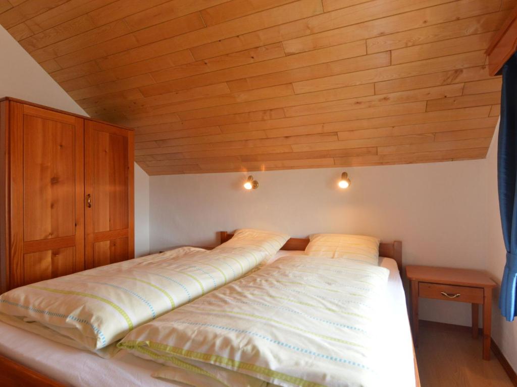 Postel nebo postele na pokoji v ubytování Holiday home in Butgenbach near the Lake