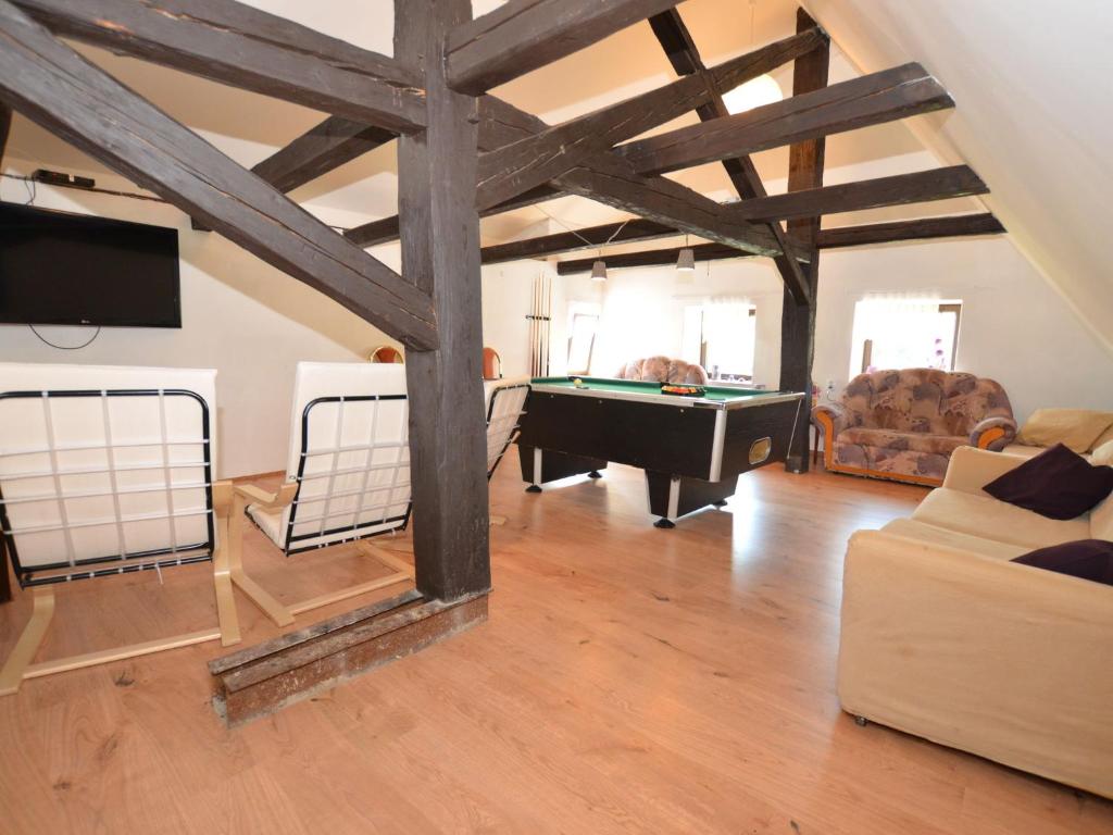 TV a/nebo společenská místnost v ubytování Vacation House Featuring Sauna