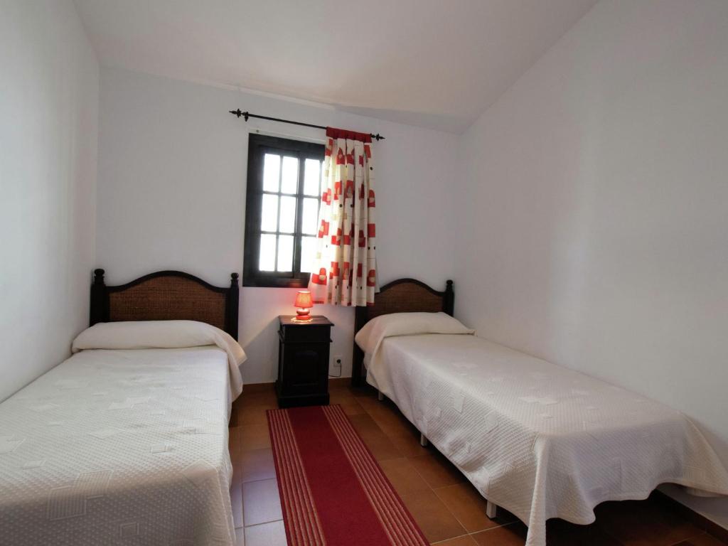 Postel nebo postele na pokoji v ubytování Villa in Arenas with private pool