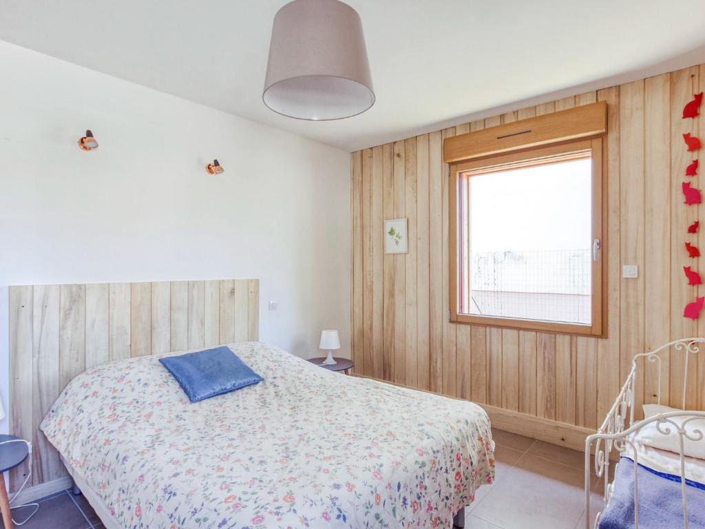 Postel nebo postele na pokoji v ubytov&aacute;n&iacute; Pleasant Cottage in Challerange