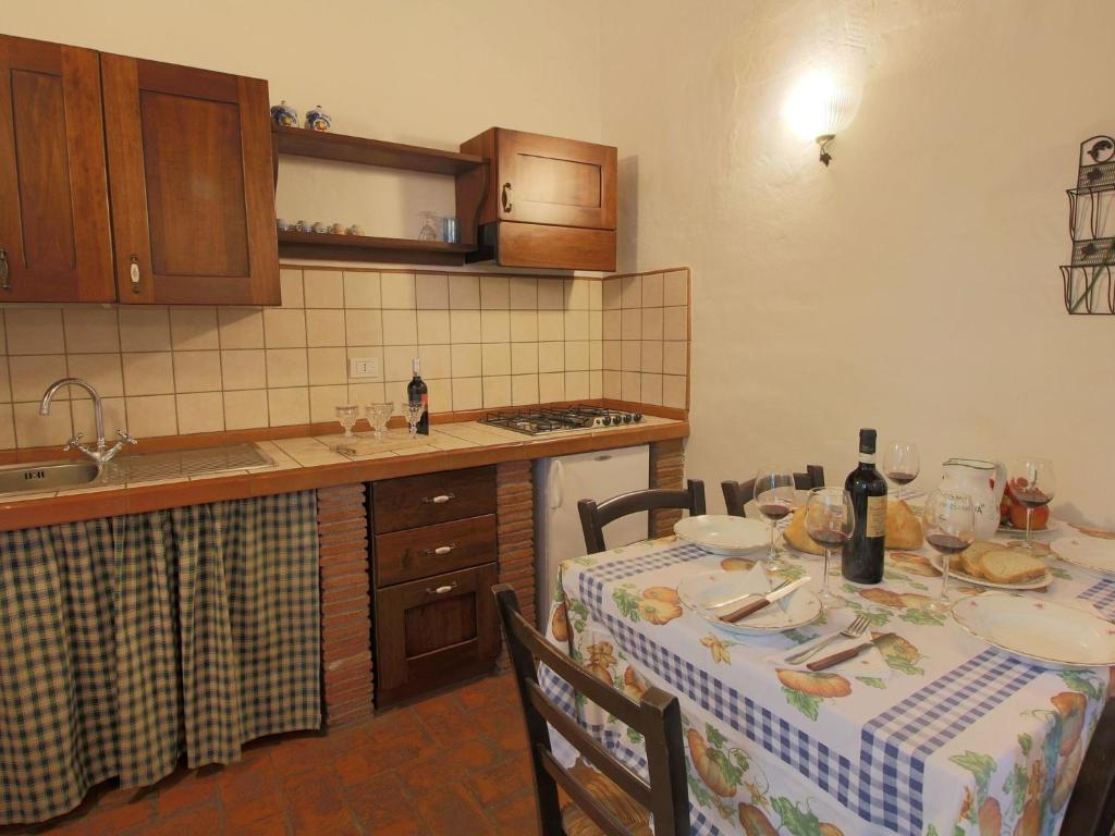 A kitchen or kitchenette at Farmhouse in Proceno with Pool and Terrace