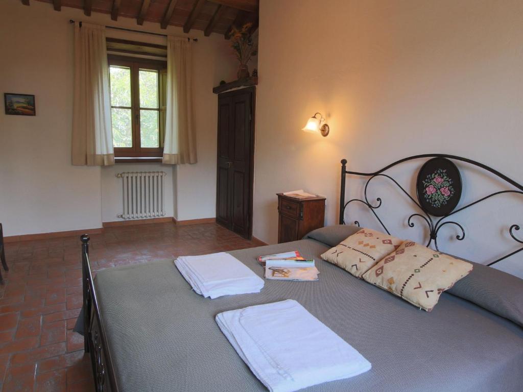 A bed or beds in a room at Farmhouse in Proceno with Pool and Terrace