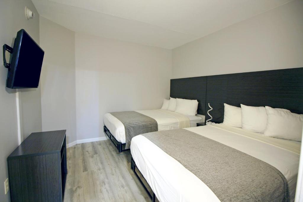 Postel nebo postele na pokoji v ubytování Bolero Resort