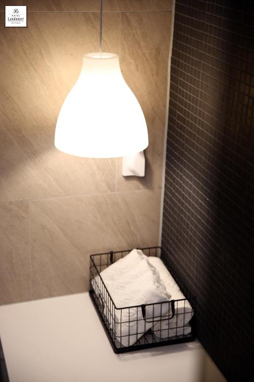 Postel nebo postele na pokoji v ubytování Londoner Hotel Gwangan