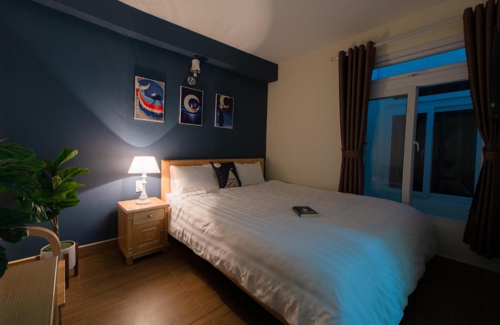 Moc Thach Hostel Dalat客房内的一张或多张床位