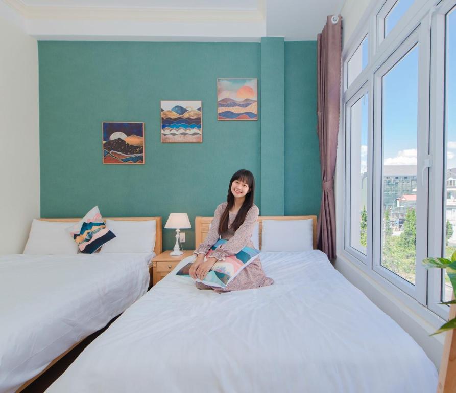 Moc Thach Hostel Dalat客房内的一张或多张床位