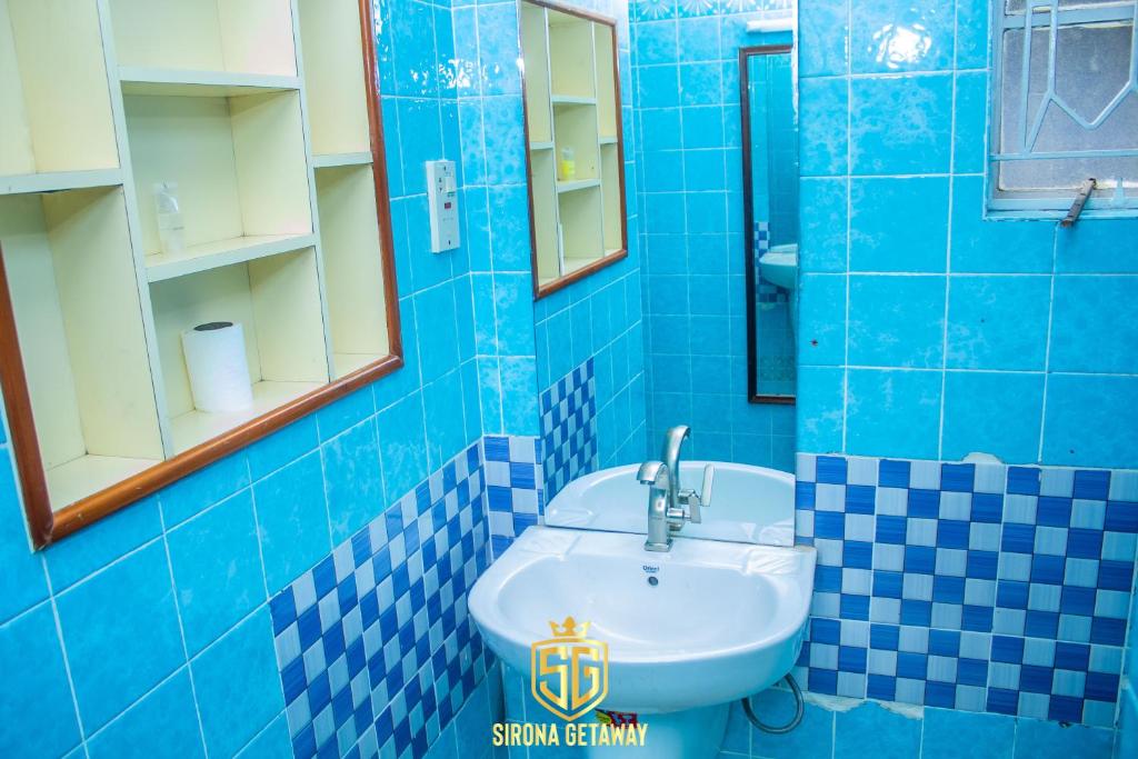 Koupelna v ubytování Sirona Getaway Hotel