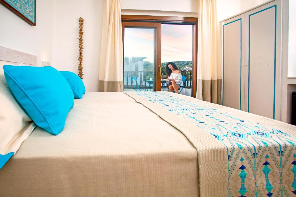 Postel nebo postele na pokoji v ubytování LH Hotel La Funtana