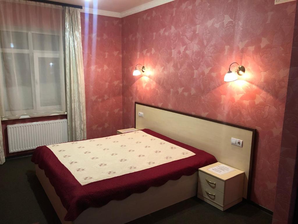 Postel nebo postele na pokoji v ubytování Hotel Т2