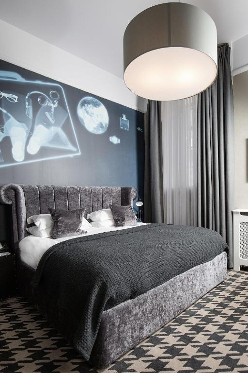 Postel nebo postele na pokoji v ubytování Malmaison Glasgow