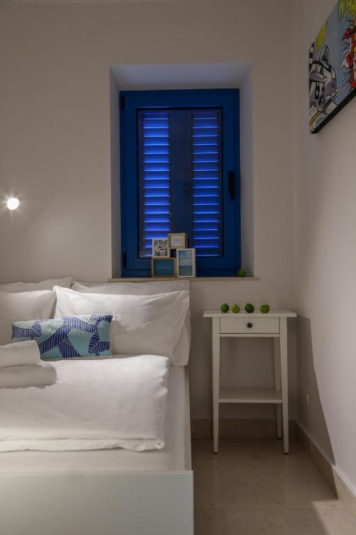 Posteľ alebo postele v izbe v ubytovaní Hvar Old Dalmatian House Junior Suite - Deck 2