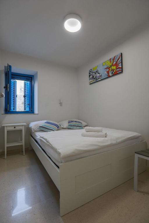 Posteľ alebo postele v izbe v ubytovaní Hvar Old Dalmatian House Junior Suite - Deck 3
