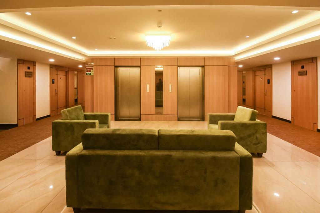 Posezení v ubytování Emerald Clarks Inn Suites