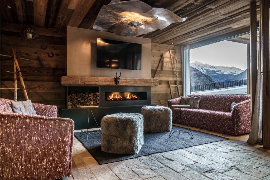 Posezení v ubytování Chalets - The Peak