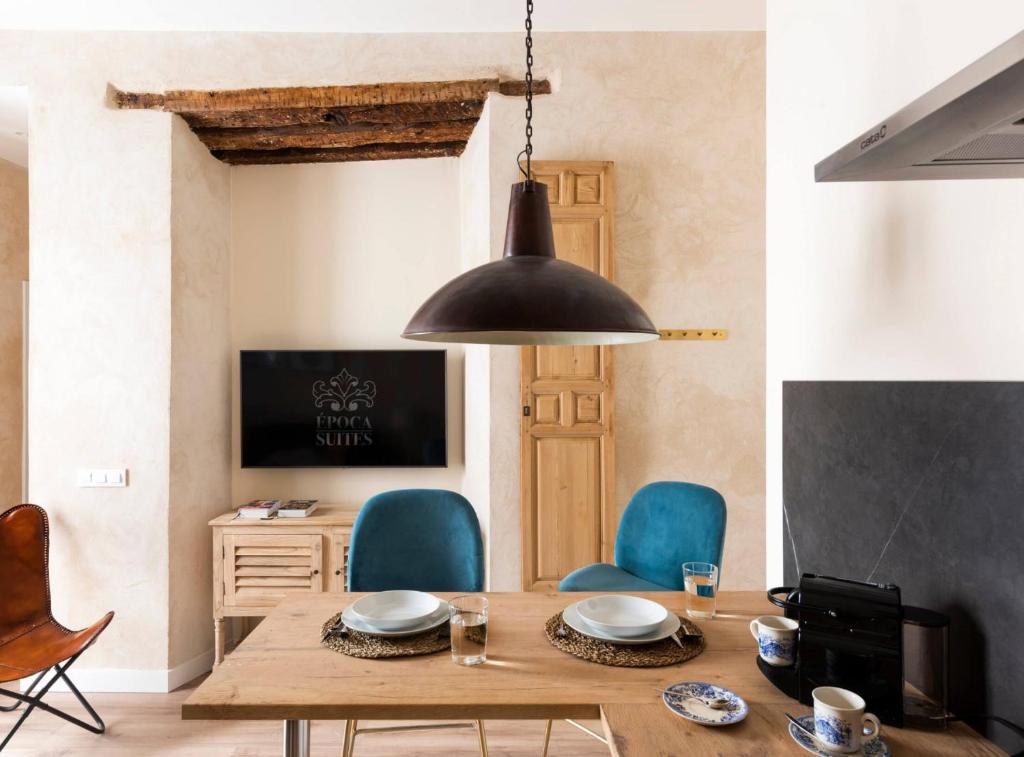 TV a/nebo společenská místnost v ubytování Casa Sevilla 1855 Suites by Época