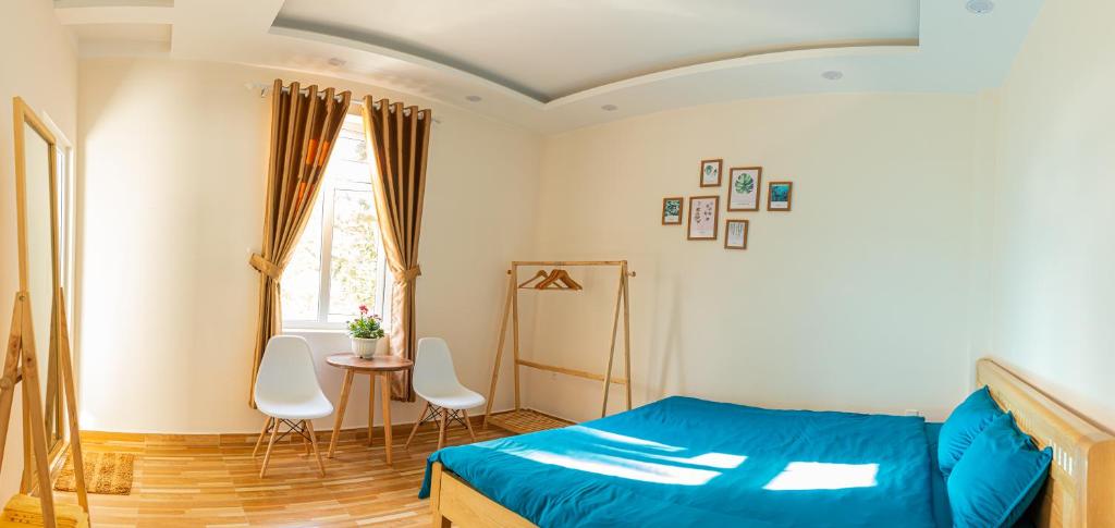 Postel nebo postele na pokoji v ubytování Caly homestay