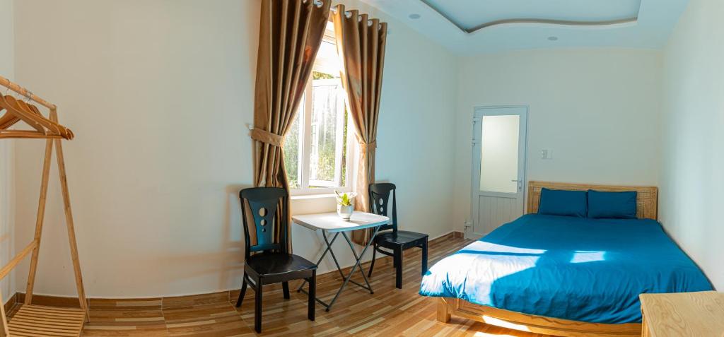 Postel nebo postele na pokoji v ubytování Caly homestay