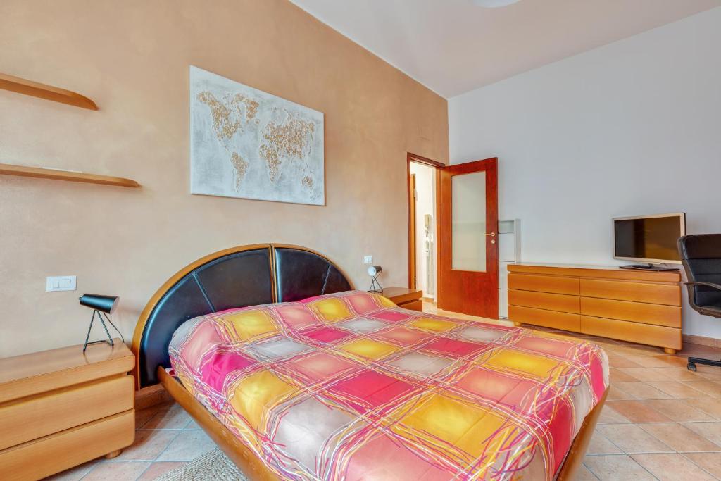 Posteľ alebo postele v izbe v ubytovaní Darsena & Navigli Cosy Flat