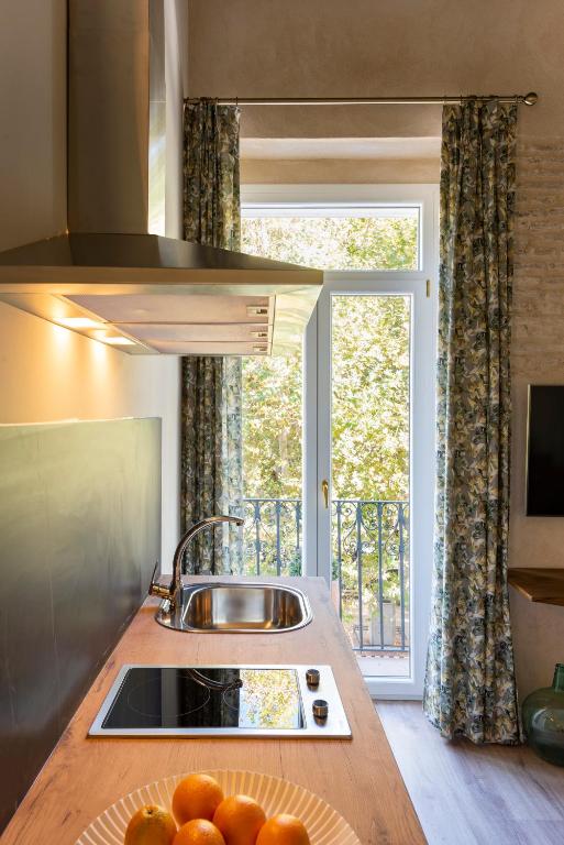 Kuchyň nebo kuchyňský kout v ubytování Casa Sevilla 1855 Suites by Época