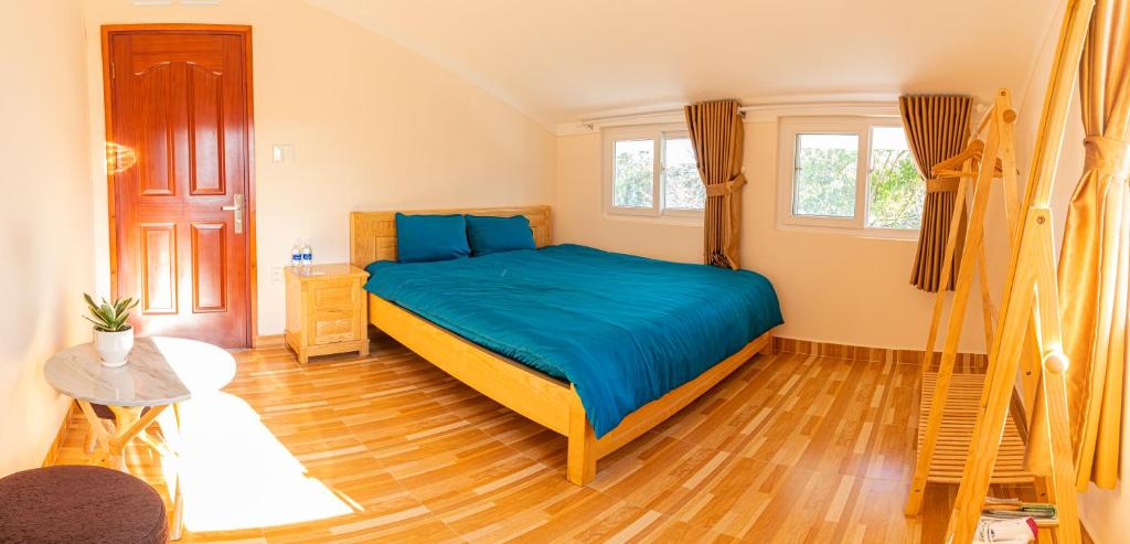 Postel nebo postele na pokoji v ubytování Caly homestay