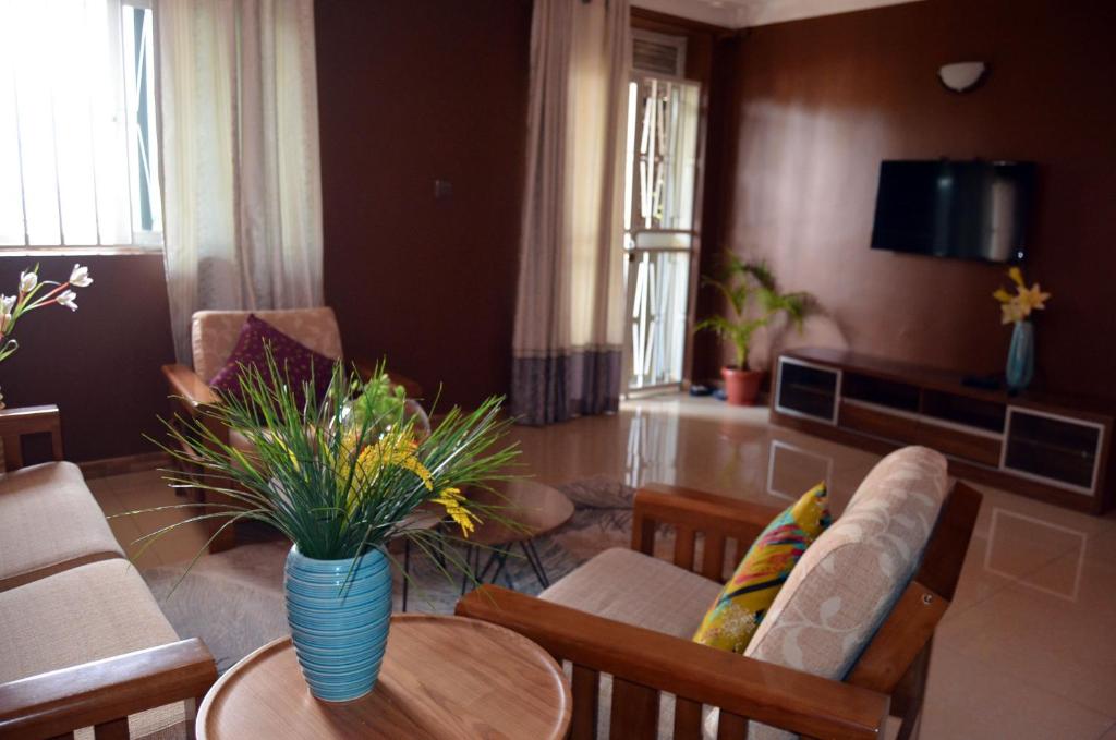 TV a/nebo společenská místnost v ubytování Ewaffe@AKUA special OnPoint 2bedroom Home