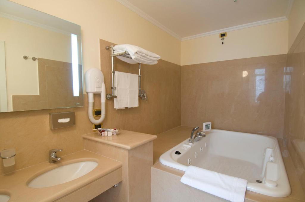 Koupelna v ubytování Grand Hotel Piazza Borsa